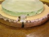Mirror grinding small platter - tool on top showing routing of clamp nut retaining slots.